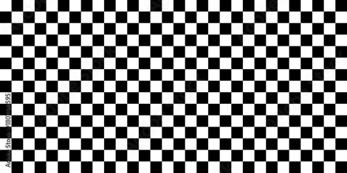 Black and white seamless checkered pattern resembling a chessboard texture. Black and white checkered seamless pattern. 