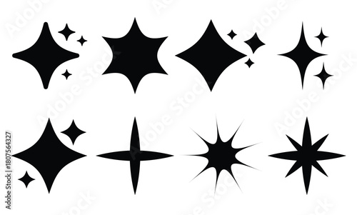 Collection of eight different black silhouette shapes representing various sparkle, star, and shine icons, perfect for indicating brightness or magic, isolated on