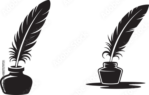 Two black quill pens resting in inkwells on a clean white background