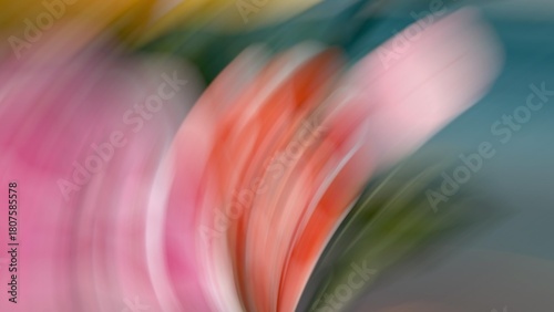 Dynamic motion blur abstract background with streaks of vibrant pink, orange, and teal green color