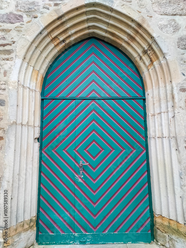Old wooden door with colourful paint