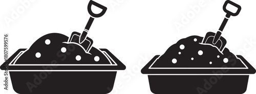 Two sandbox piles with shovels silhouette