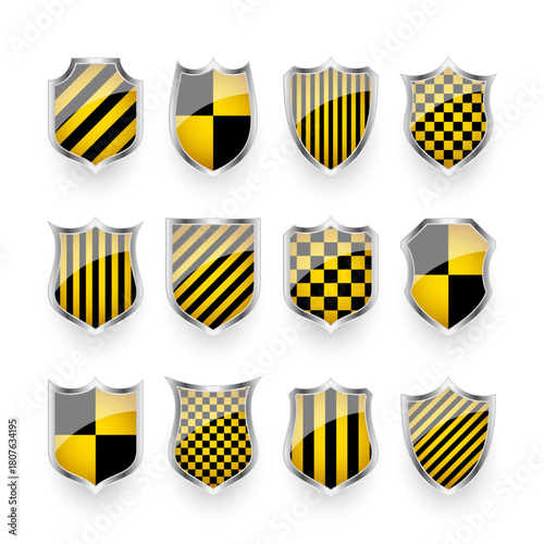 Glossy shields with yellow and black pattern. Security and protection concept. Cyber safety icons, internet privacy, web defense, digital data protection and antivirus themes. Vector illustration
