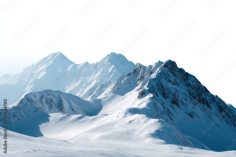 Obraz premium Majestic snowy mountain range, blue sky, winter landscape, pristine peaks