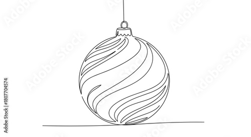 Christmas tree ornament with abstract swirling designs in white  