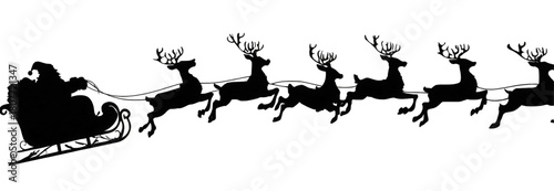Black silhouette of Santa Claus flying in his sleigh with reindeer.