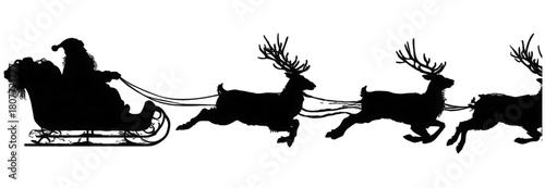 Christmas silhouette of Santa Claus riding his sleigh with reindeer.