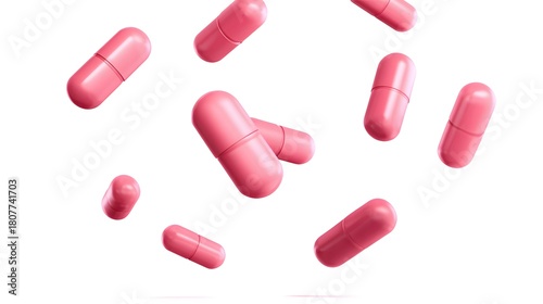 Pink medical capsules falling on a white background. pink pills falling on a white background with copy space. Pink pills flying in the air on white background. Pink pills falling on white background