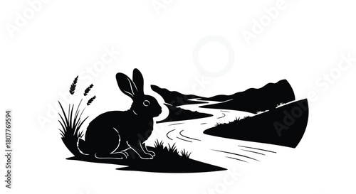 Solitary rabbit silhouetted against a serene landscape with a winding river and hills under a bright sun.