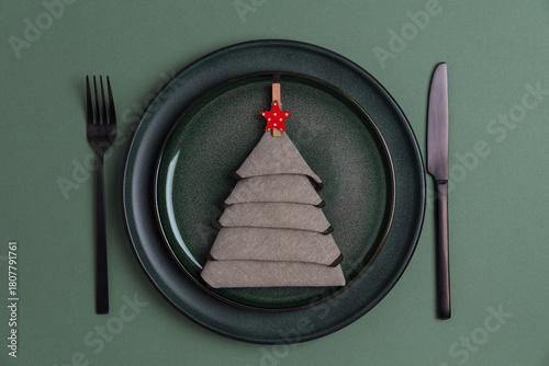 Elegant Christmas Table Setting with Napkin Tree and Red Star Ornament