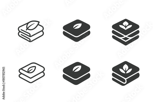 Freshness Icon Set. Laundry and clothing hygiene. Icon set. Set Logo of freshness: folded towel with leaf symbol. harmonious logo variations of the same