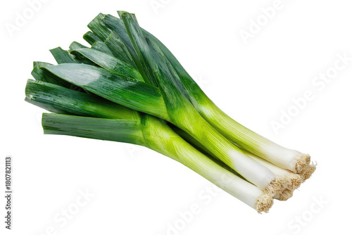 Close-up of fresh leeks, vibrant green leaves with white bulbous base
