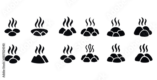 Set of black geothermal stone icons with steam rising