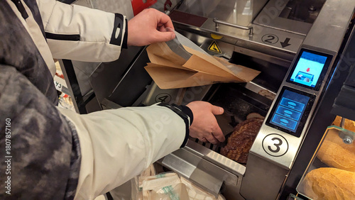 Customer Using Automatic Bread Slicing Machine and Packaging Bags