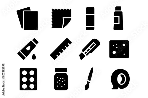 Art Collage Essentials. Art collage materials. Solid icon set of Art collage materials: colored paper, fabric piece, cardboard, glue stick, paint tube, ruler,