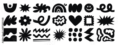 Abstract doodle elements with spirals, plants and wavy lines in naive style. Monochrome line art, hand drawn.