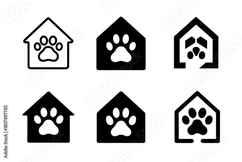 Pet-Friendly Home Logos. Pet-friendly home ideas. Icon set. Set Logo of pet-friendly home ideas: house silhouette with paw print inside. harmonious logo