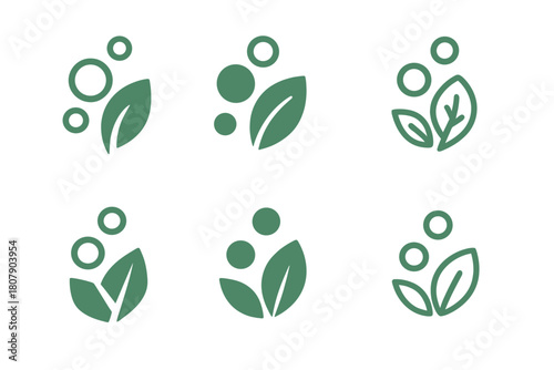 Eco-Friendly Cleaning Logos. Non-toxic household cleaning solutions. Icon set. Set Logo of Non-toxic household cleaning solutions: soap bubbles and leaf.