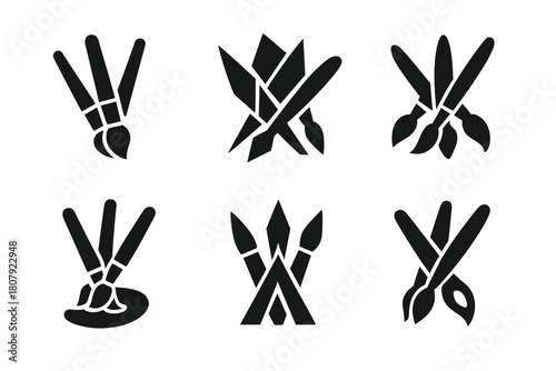 Artists' Creative Collaboration. A group of artists working together on a large community mural project. Icon set. Set Logo of Paint Brushes: Multiple brushes