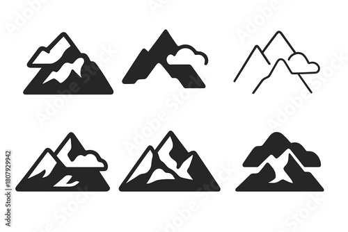 Distant Mountain Logos. Distant Mountains. Icon set. Set Logo of Distant Mountains: Snow-capped peaks. harmonious logo variations of the same emblematic