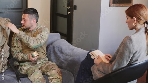 A soldier reveals the poor food served in the army and seeks support at a counseling session on anxiety and trauma recovery in a comfortable therapeutic setting.