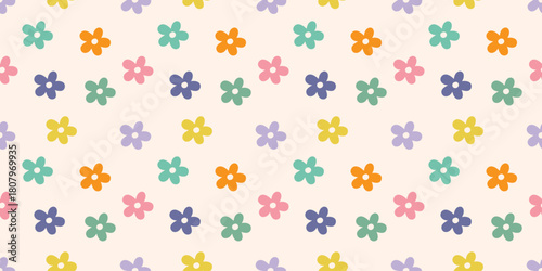 Seamless pattern with colorful abstract daisy flowers on a light background