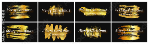 Merry Christmas and Happy New Year incription on gold smear