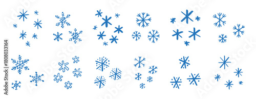 chalk pencil drawing blue snowflakes set. Snowflake doodle hand drawn cute style elements. Winter or Christmas concept.