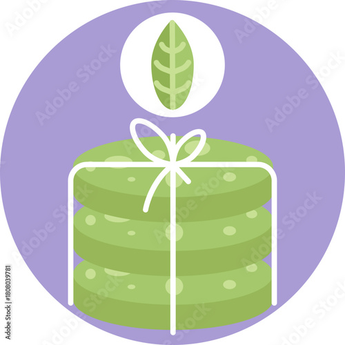 Sweet Treat: A small, round cookie with a bite taken out, perfect for enjoying alongside matcha tea.