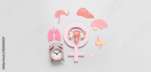 Alarm clock with paper symb...