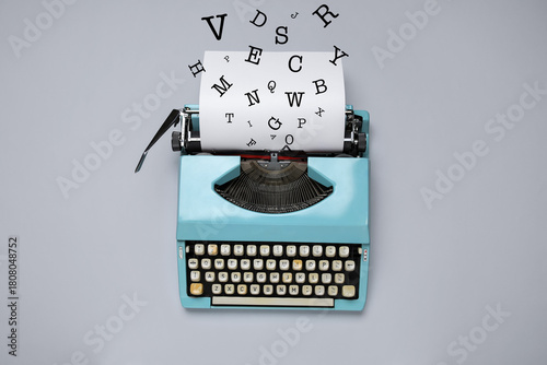 Vintage blue typewriter wit...