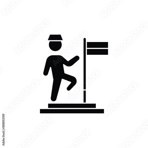 A black silhouette of a person climbing steps towards a flag, symbolizing achievement and success.