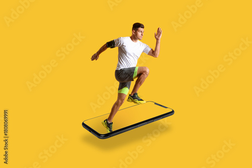 Sporty male runner on color...