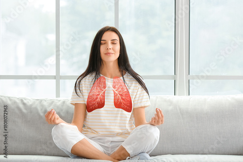 Young woman meditating on s...