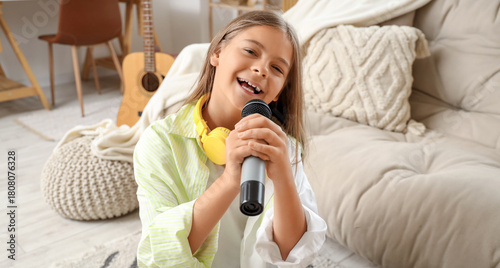 Little girl with microphone...