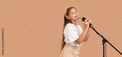 Little girl with microphone...