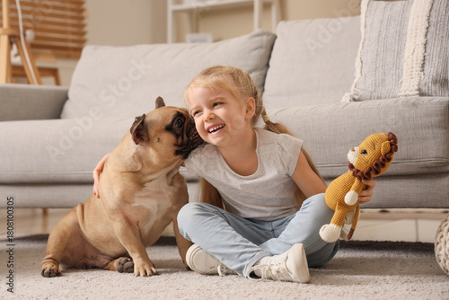 Cute happy little girl with...