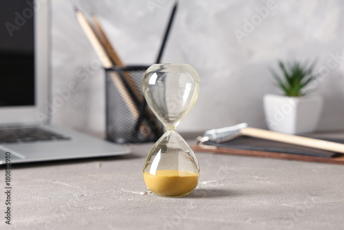 Stylish hourglass with yell...