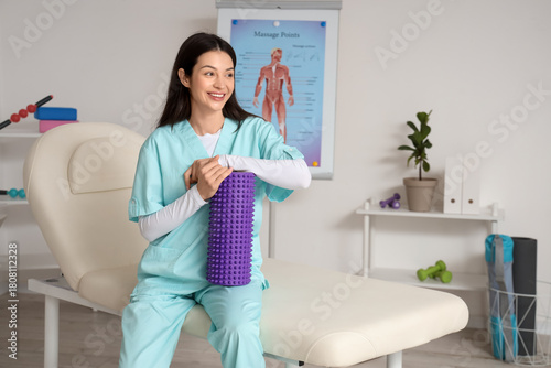 Female physiotherapist with...