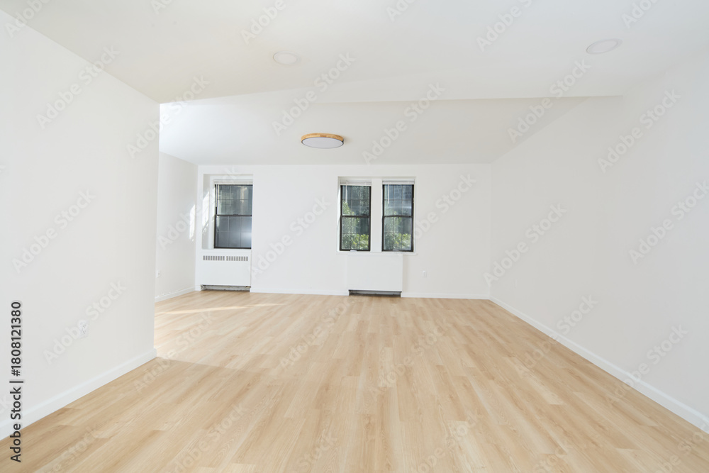 Fototapeta premium Bright empty white room with natural wood floors
