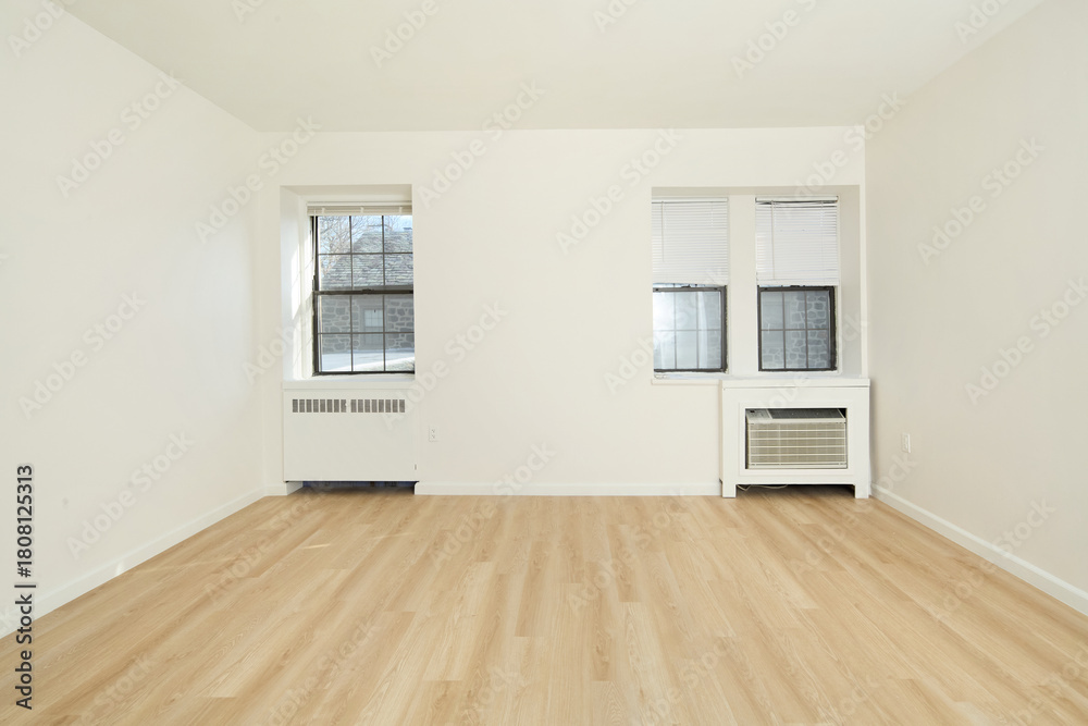 Fototapeta premium Bright empty white room with natural wood floors