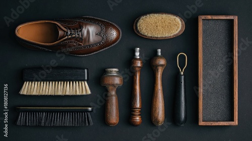 shoe care set with black leather loafer and brushes 
