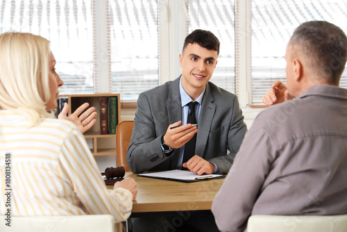 Male lawyer working with ma...