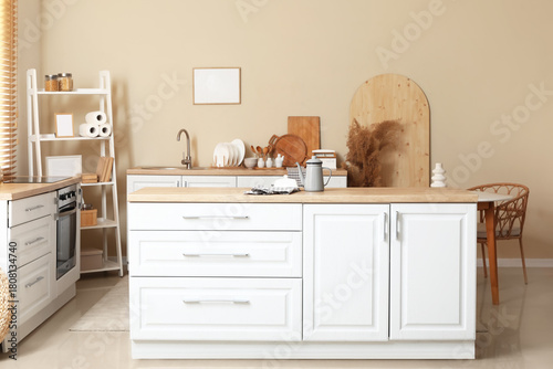 Interior of kitchen with te...