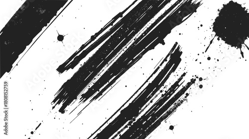 Abstract black ink brush strokes and splatters on
