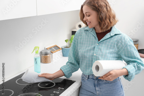 Young woman with roll of pa...