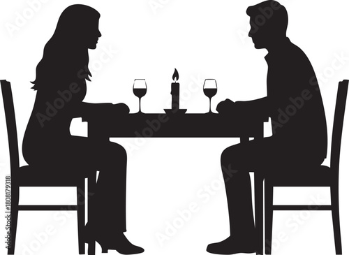 Silhouette of couple having romantic dinner with candle
