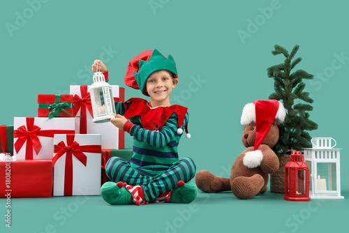 Little happy boy in elf cos...