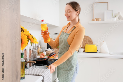 Young housewife with sunflo...