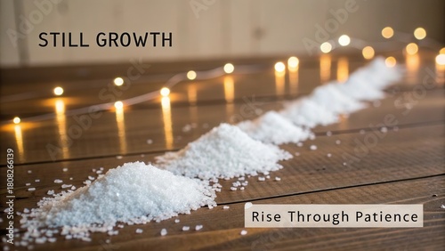 Still Growth and Rise Through Patience: Artistic Composition of Salt Piles on Wooden Table with Twinkling Lights